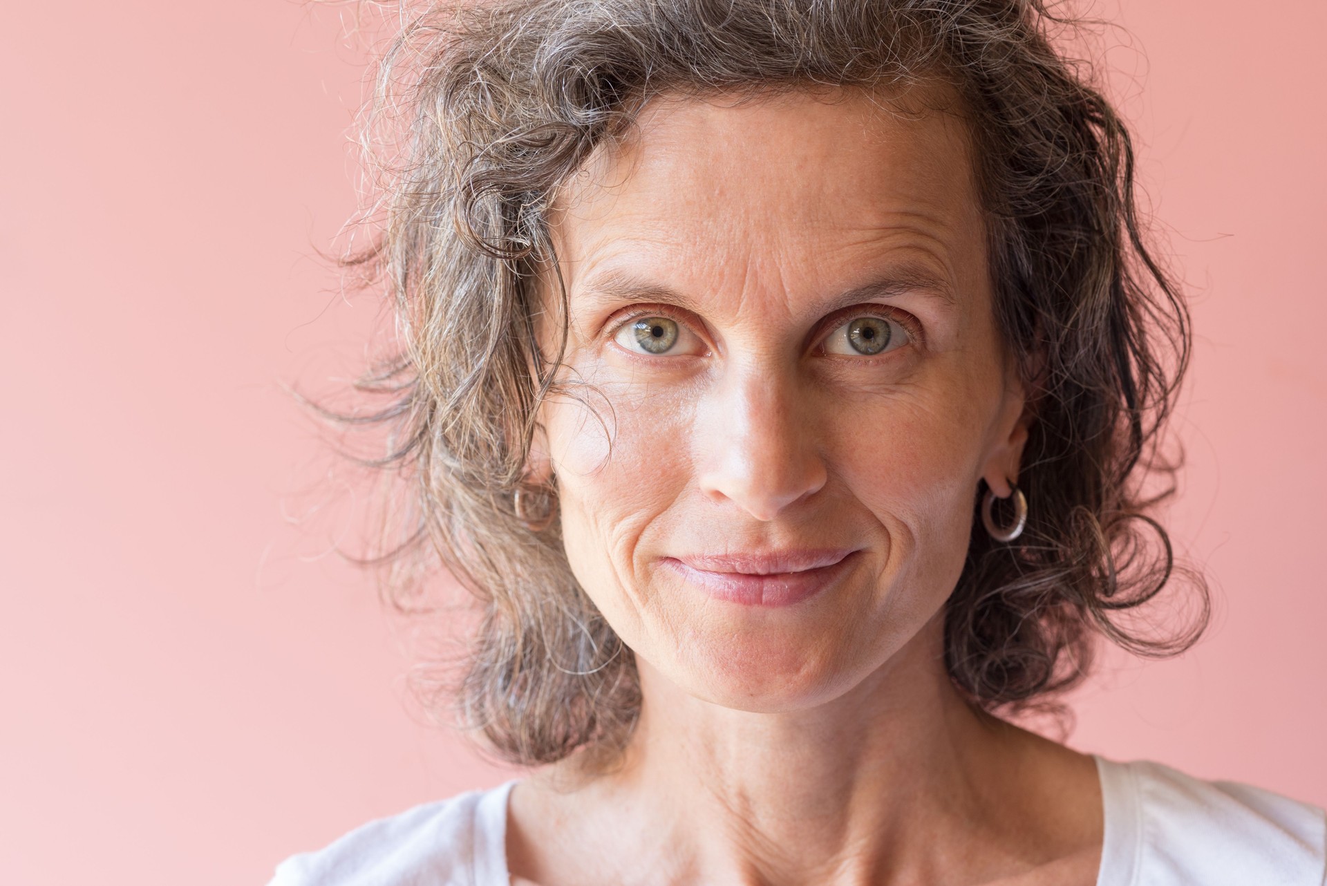 Portrait Of Woman Against Wall